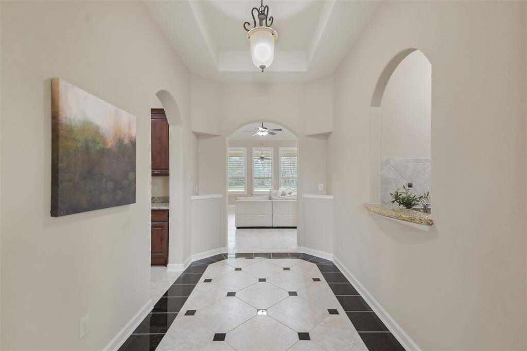 Plenty of space for a bench or table in this foyer area