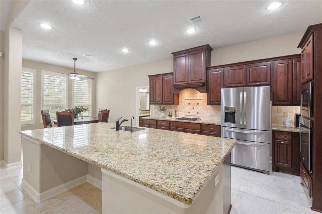Kitchen is also open to breakfast area.