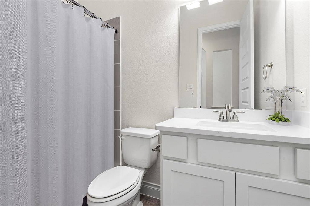 Full bath #3 shared by bedrooms #3 and #4.