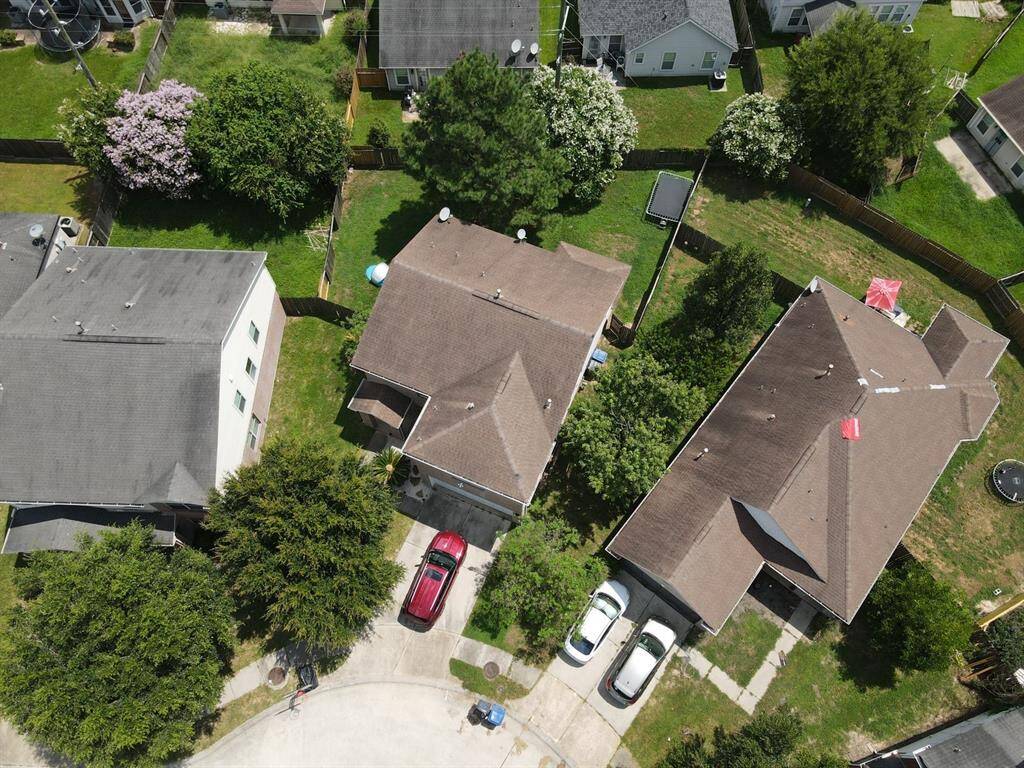 The aerial view showcases the clean architectural lines and compact, efficient design of this home.