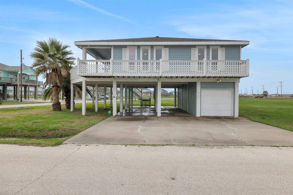 Looking for the ultimate home away from home? This is it! Step inside this gorgeous coastal retreat, where an open-concept island kitchen flows seamlessly into the dining & family room-perfect for entertaining! The split floor plan ensures privacy, with 2 bedrooms & a bath on one side & the owner’s retreat with its own bath on the other. But the real magic? The wrap-around porch-the perfect spot to soak in the salty breeze and unwind with a drink in hand!