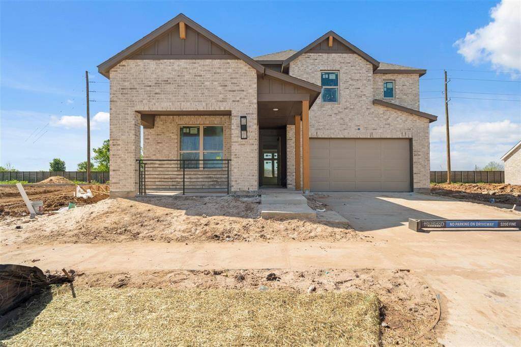 Enjoy shaded afternoons and quiet evenings from the comfort of the generous front porch.