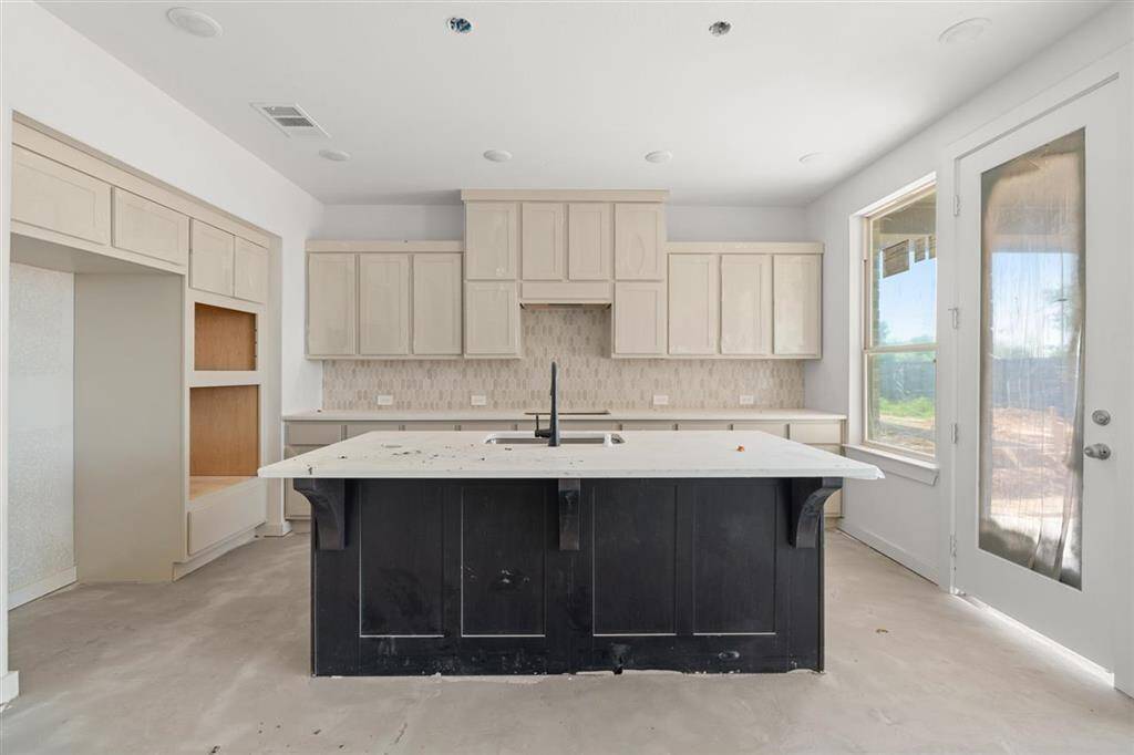 Integrated built-in appliances that blend beautifully into the cabinetry.