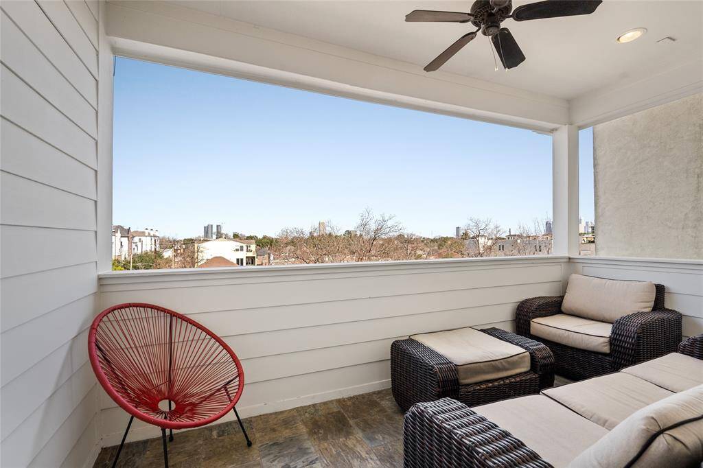 Covered outdoor patio allows for skyline views of the city.