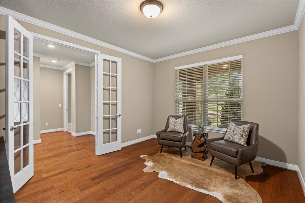 The built-in desk maximizes functionality while leaving ample space for additional furniture. Add chairs or a cozy couch to create a personalized retreat that suits your style and needs. With the study being in the front of the home you are able to look out as all your new friends arrive for your housewarming!