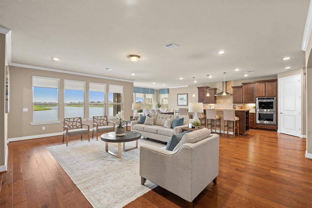Open concept living area, combining the kitchen, dining and gathering room into one spacious and open space.