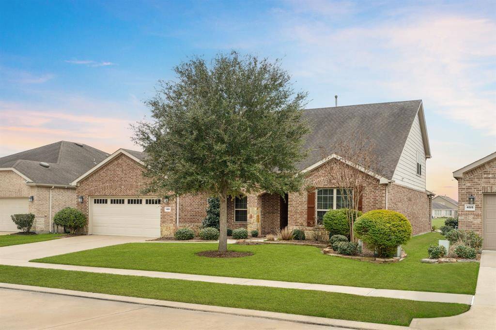 Step through the beautiful archway and onto the inviting stamped concrete porch, setting the stage for gracious living. The entry provides the ideal spot for your favorite vine to flourish, adding natural beauty and charm to your surroundings.