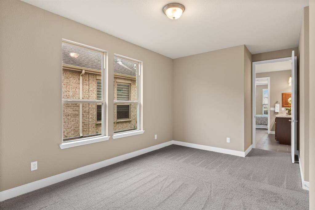 The dual owner's suite offers endless possibilities—whether you envision it as a man cave, an additional closet for extra storage, or something entirely unique. The space is versatile and ready to be tailored to suit your needs.