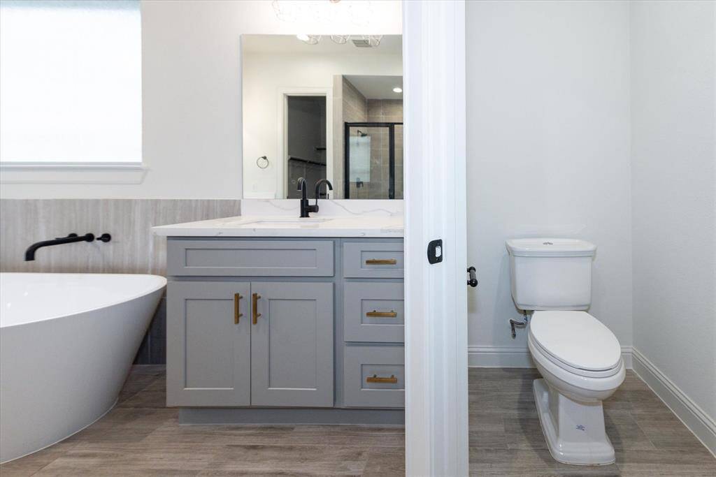 Private toilet in primary bathroom