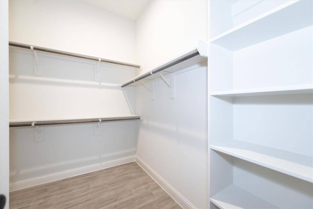 Large Walk-in closet in primary bedroom