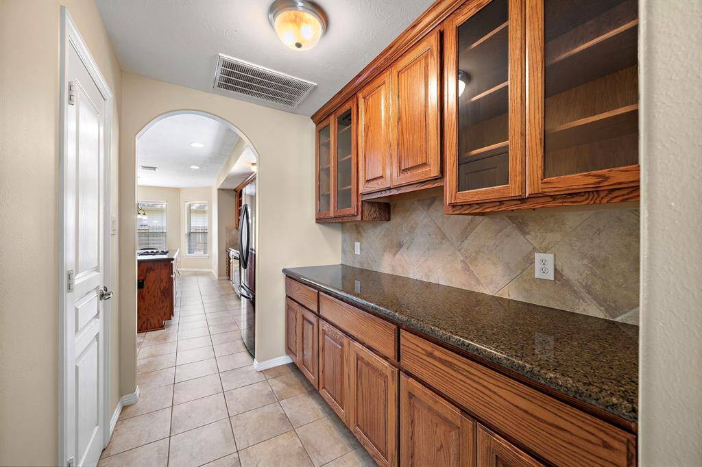 Discover convenience with a spacious walk-in pantry and an elegant butler’s pantry for effortless meal prep and entertaining.