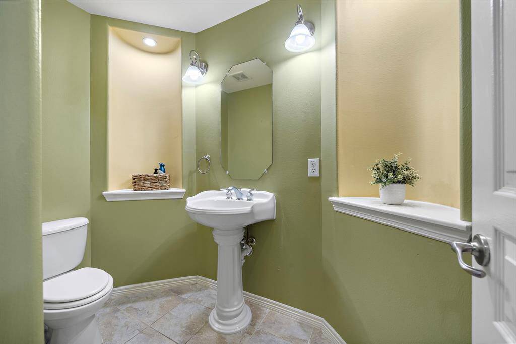 Host with ease in a conveniently located downstairs powder room, keeping the rest of your home’s restrooms private for guests.