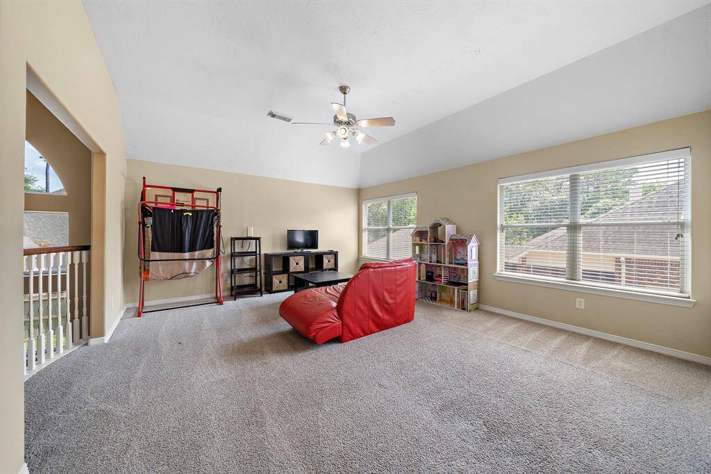 Play and relax in the game room, complete with a balcony that offers a captivating view of the downstairs areas.