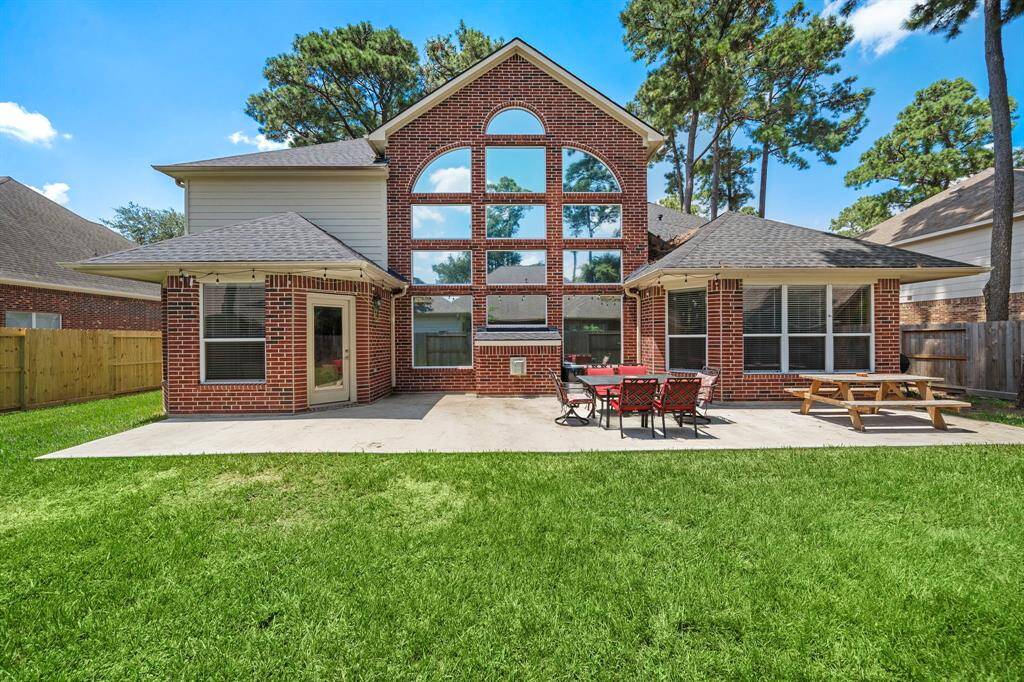 Experience endless possibilities in a spacious backyard, perfect for outdoor fun and relaxation.