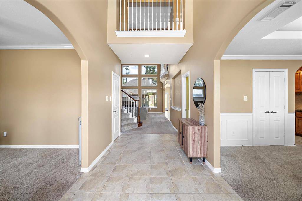 Step into elegance with a grand entrance that sets the tone for luxury and style.