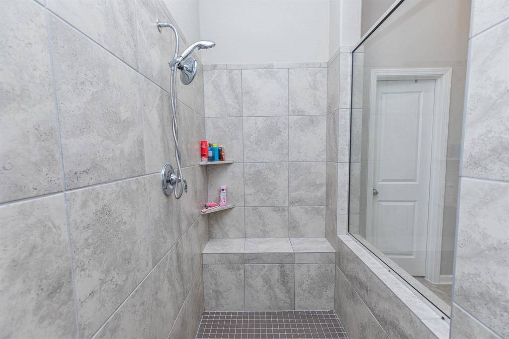walk in shower with clean and contemporary design.