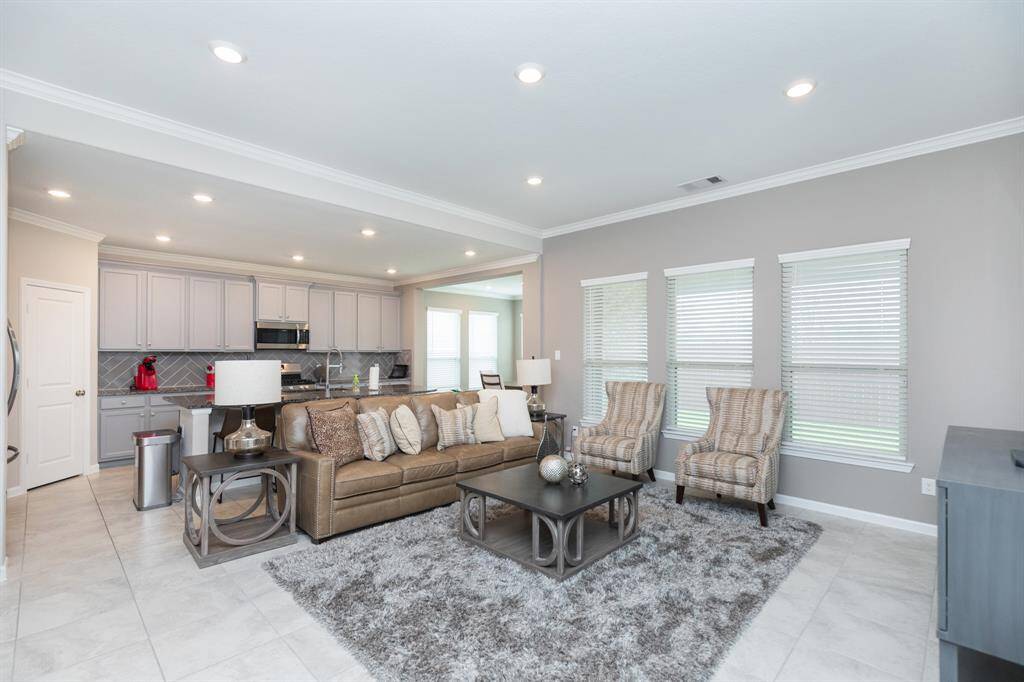 Open-concept living area creating a seamless flow ideal for entertaining.