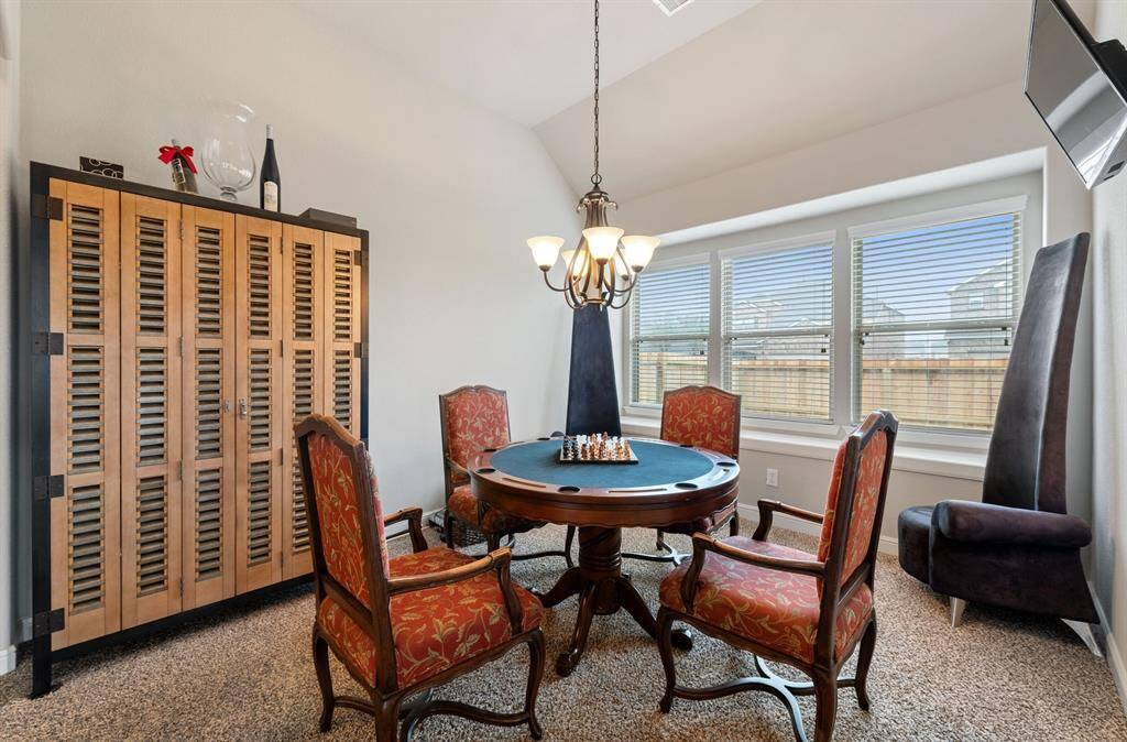 This is the formal dining room. In the other pictures you will see this room has beautiful arched entrys.