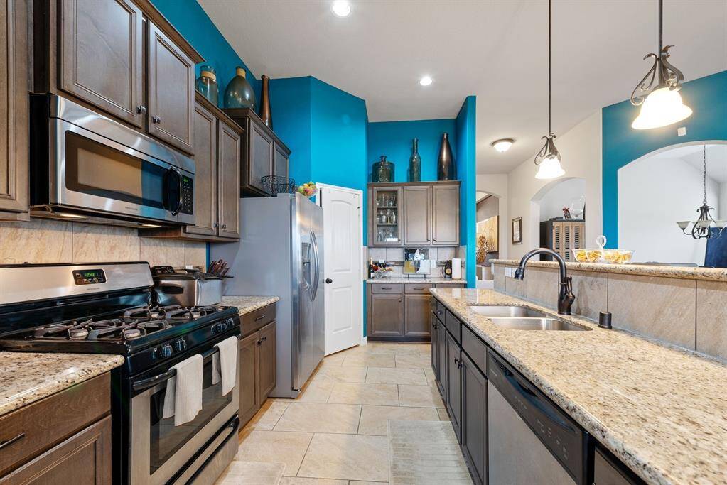 Enjoy food prep on these granite counter tops, stay organized with several upgraded cabnets for all of your cookware.