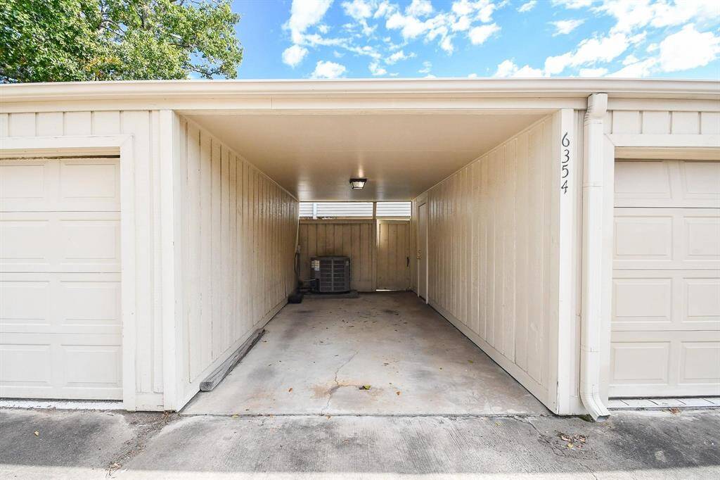 Another view of your covered carport with a neutral exterior, perfect for parking or storage.  This offers easy access to your home!