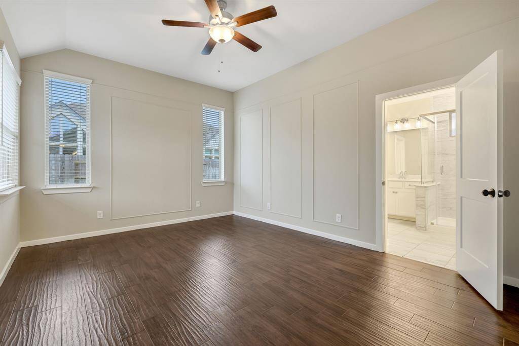 Primary bedrooms features no carpet! And an en-suite bathroom