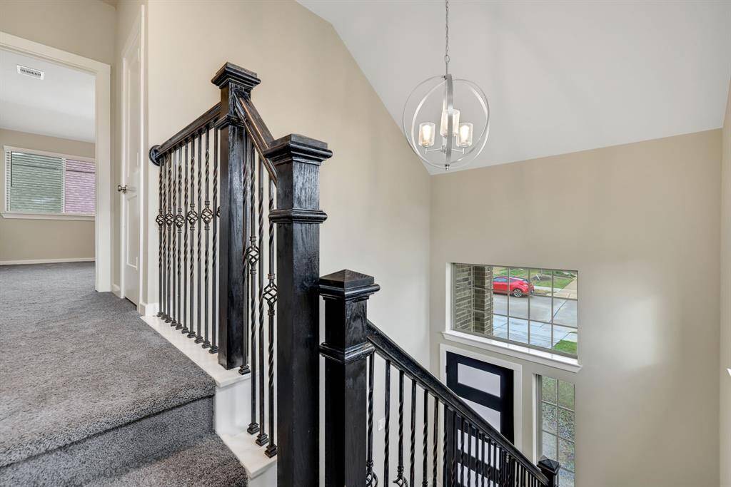 Upstairs you’ll find a fourth bedroom and full bathroom