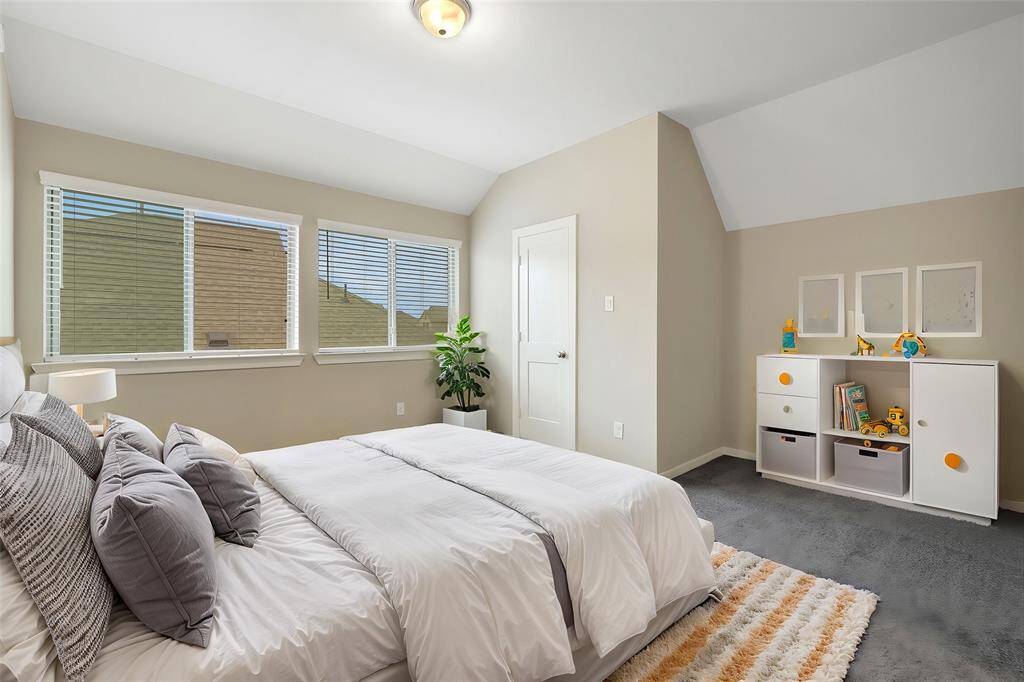 This is the fourth bedroom; it is very spacious and located upstairs and offers an en-suite bathroom