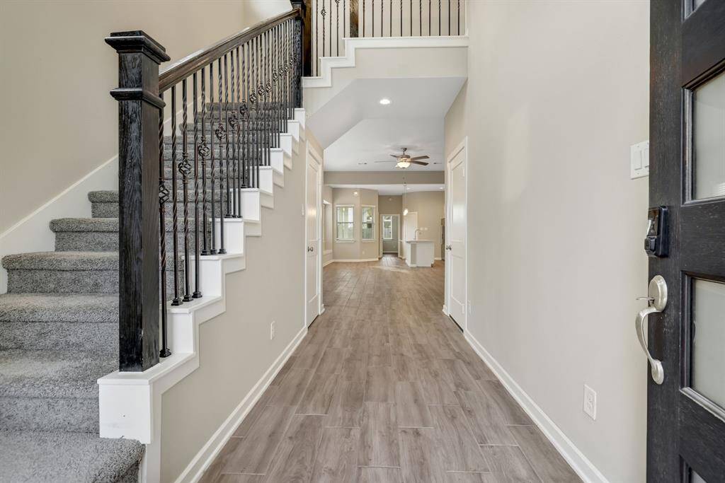 You’ll love this 1.5 Story home which offers 3 bedrooms down and 1 upstairs