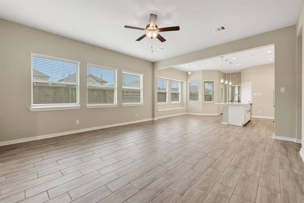 Desirable open floor plan with the family room completely open to the kitchen and dining area