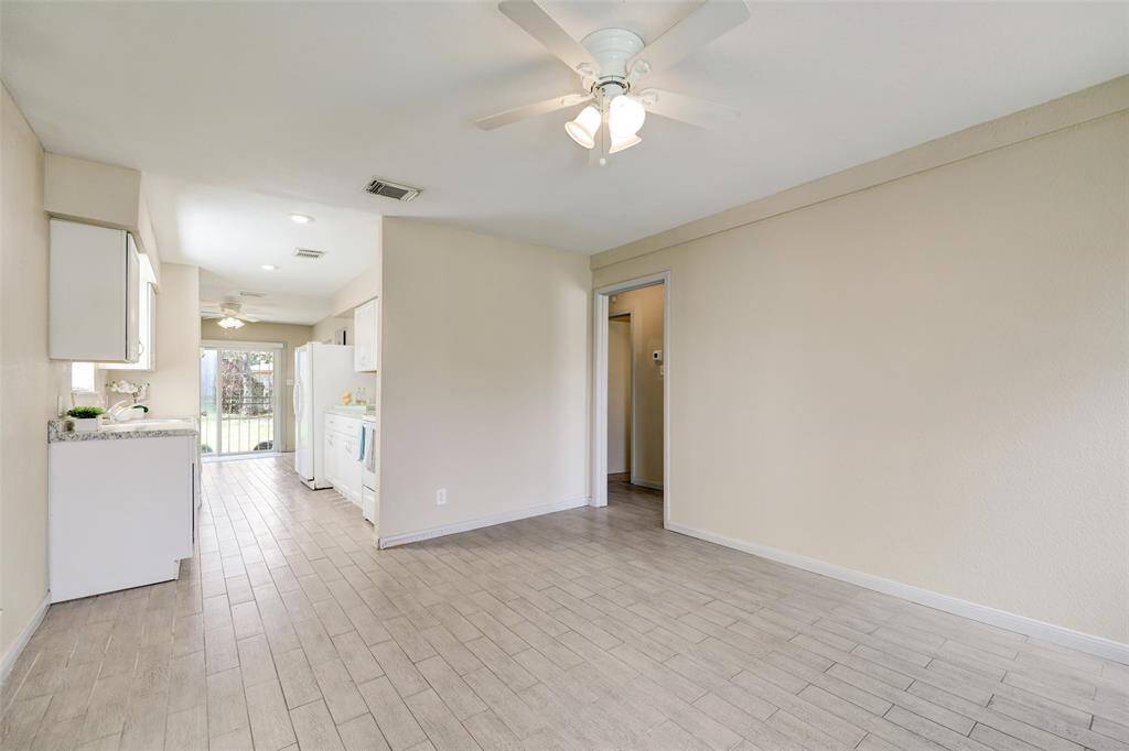 Living room opens to kitchen