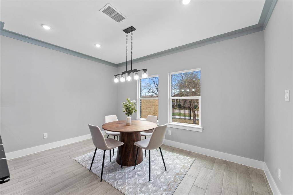 Primary bedrooms has a custom walk-in closet with built-in cabinetry.