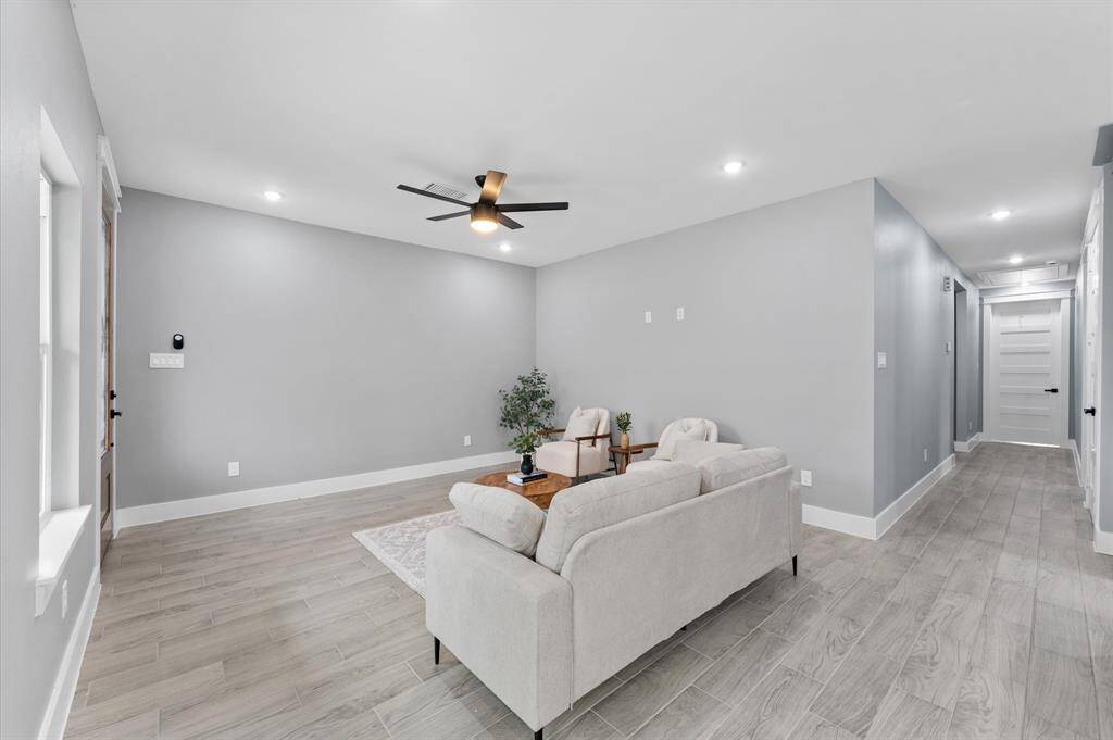 Energy-efficient LED lights illuminate every corner of this home, enhancing the modern ambiance.