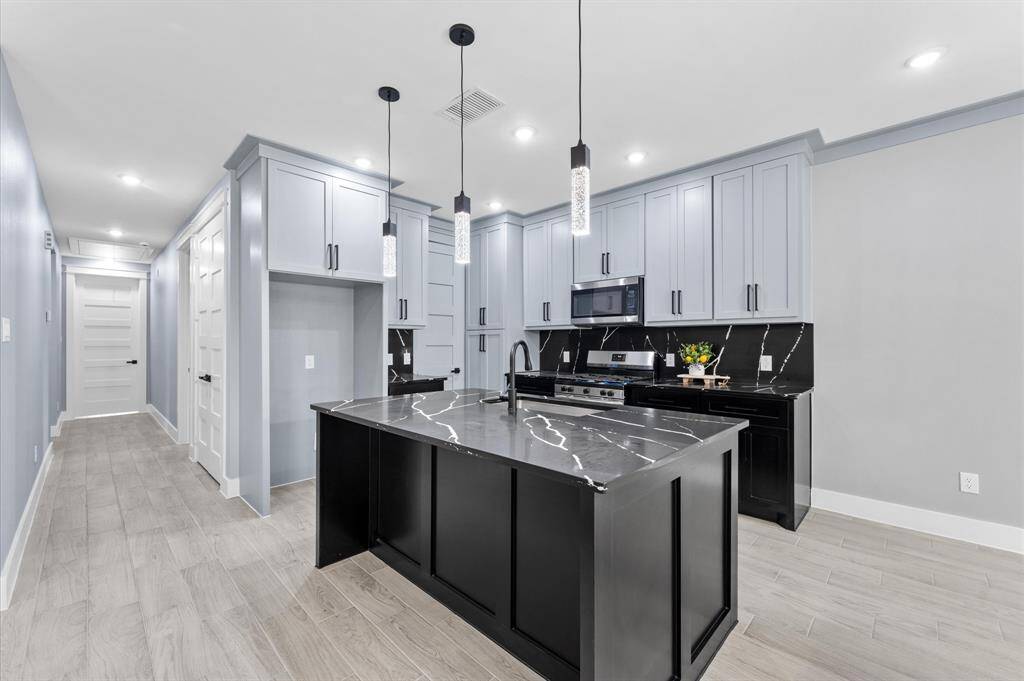Dining space open to the kitchen and living areas.