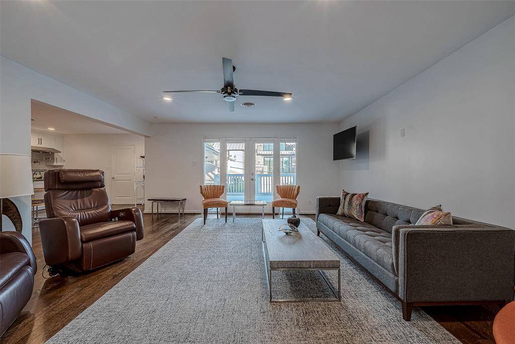 There is a wide entry to the kitchen.  The glass doors lead to the deck.