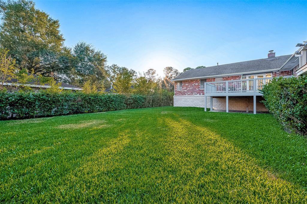 View of the back of the home.  Note that it is all brick.