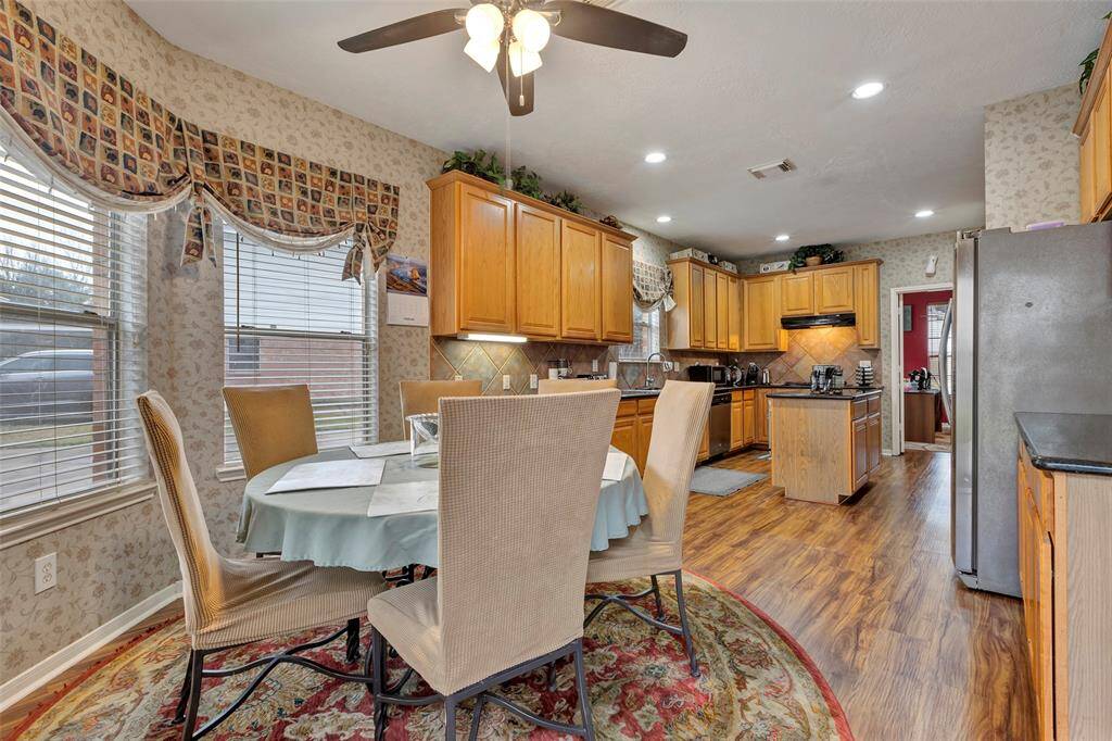 View from kitchen to home office. Ceiling fan with lights 2024.