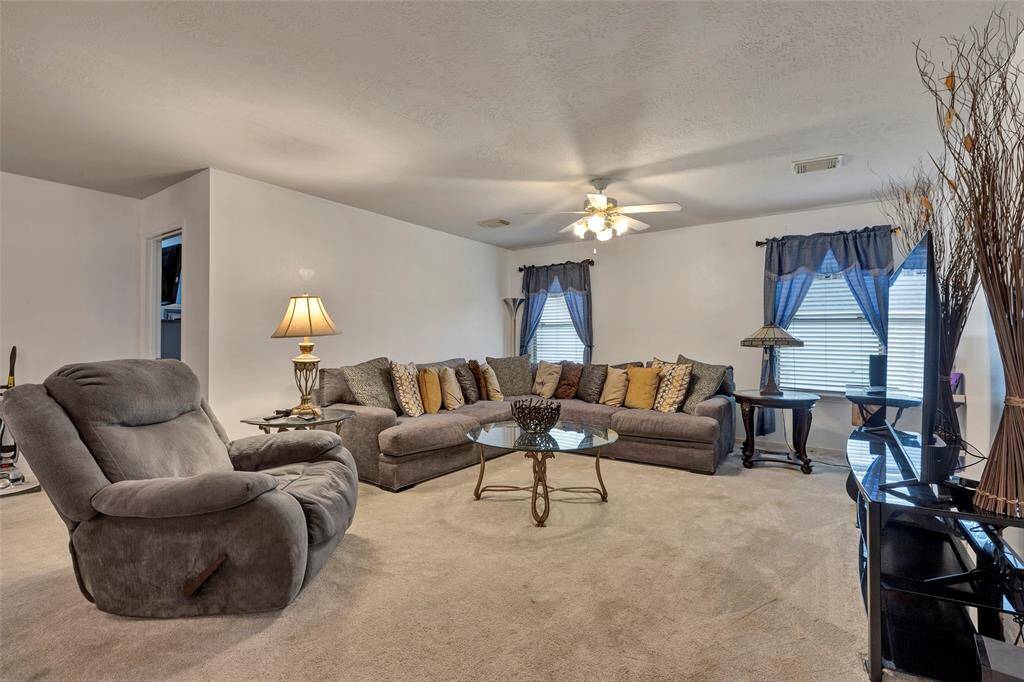 Recent carpet 2023. Large gameroom up.