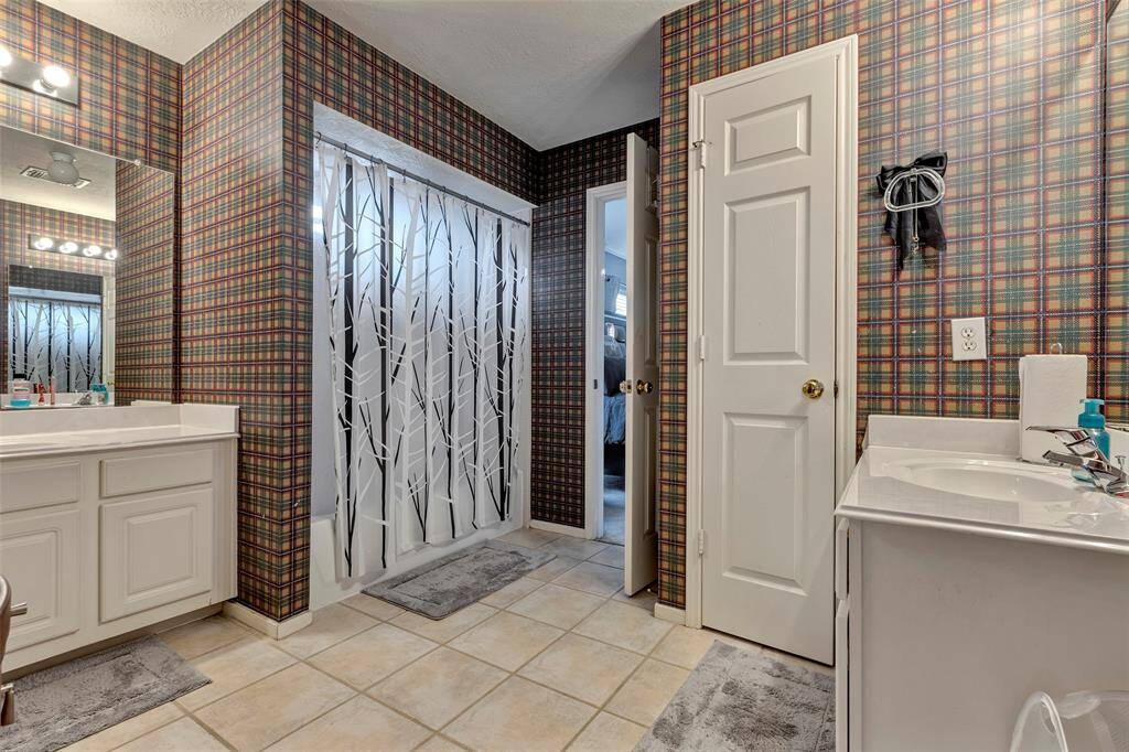 All toilets updated 2023. This spacious bathroom is shared with 2 of the bedrooms upstairs. Tub/shower. Linen closet. Tile floors. Double sinks.
