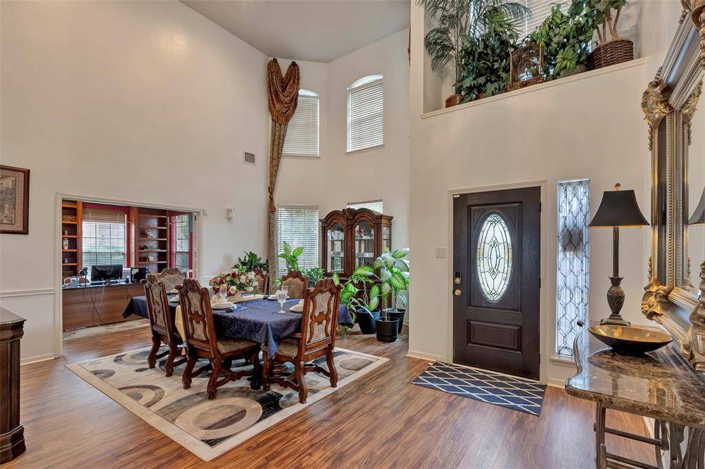 High ceiling. Open to study. Recent wood like floors. Fresh paint. This room can either be a formal living room or a large dining room for entertaining.