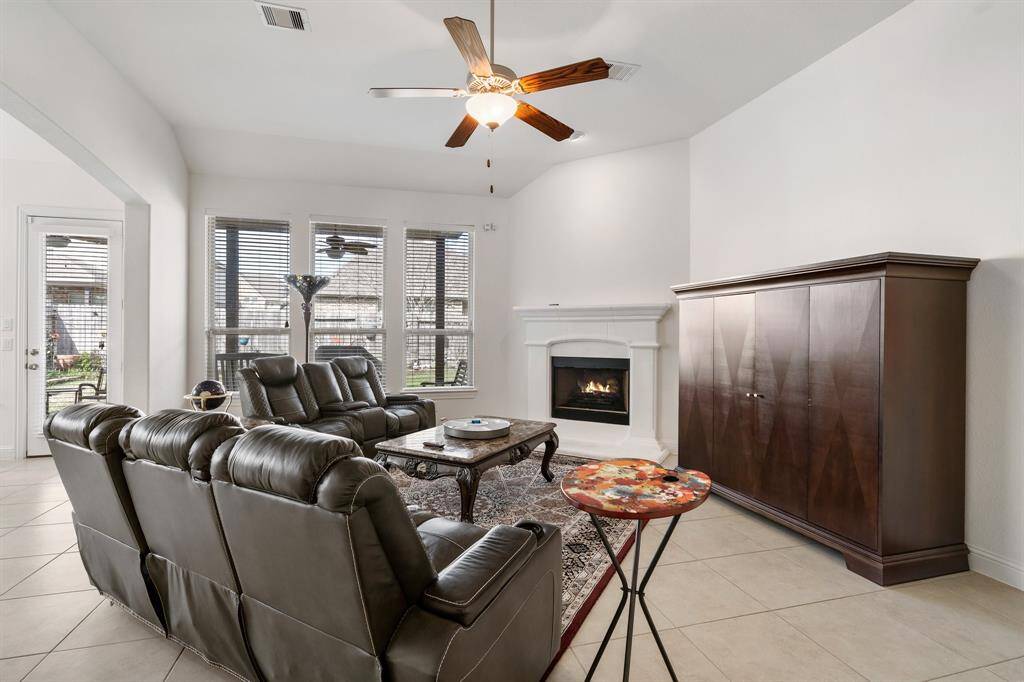 Step into this functional home office, where productivity meets comfort.This room offers privacy while maintaining a sense of openness, making it ideal for remote work or study sessions.