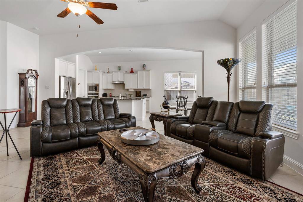 High ceilings with crown molding, lend a timeless appeal to the formal dining room.