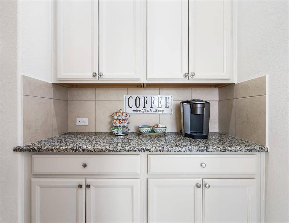 Open layout with arched architectural details give this home a sophisticated touch.