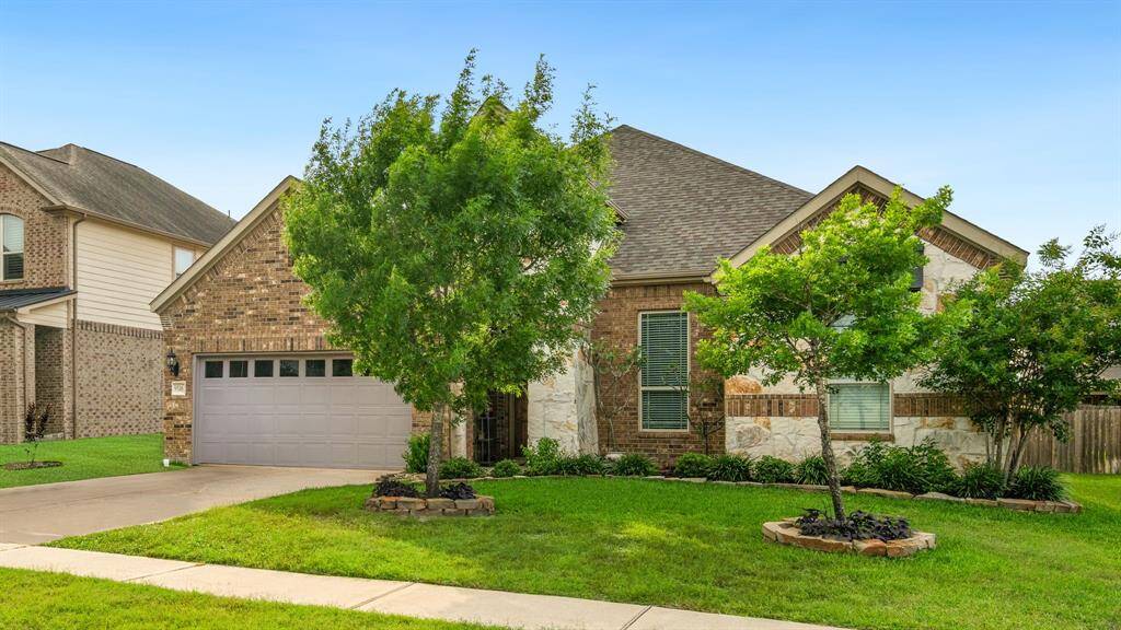Inviting open-concept living area features a spacious layout with abundant natural light.