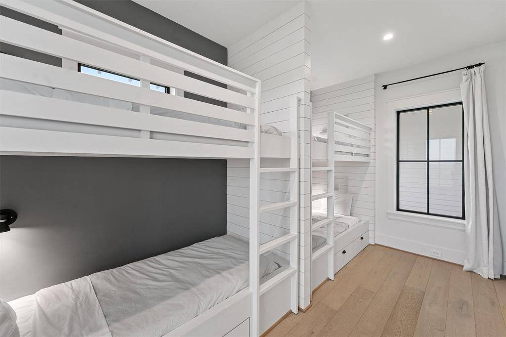 Thoughtfully designed built-in bunk beds maximize space while adding a fun, coastal touch.