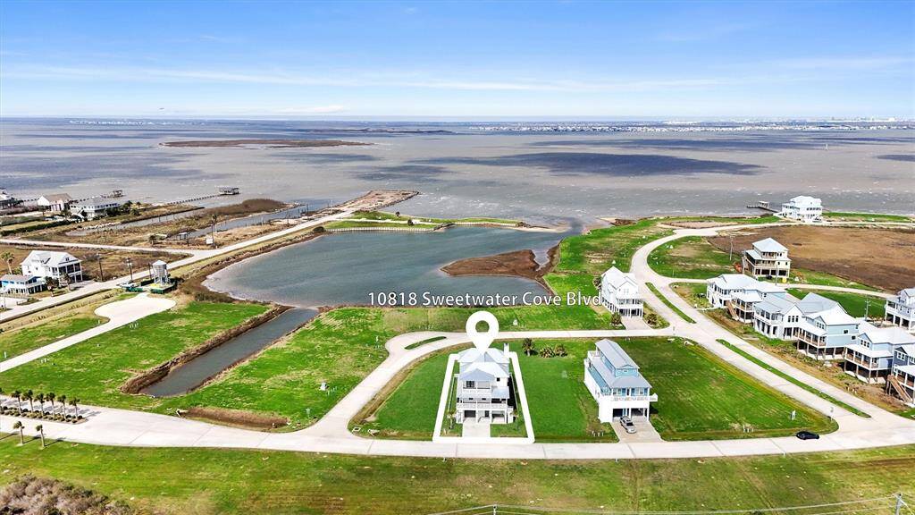 Aerial view showcasing the expansive property and well-designed outdoor living spaces.