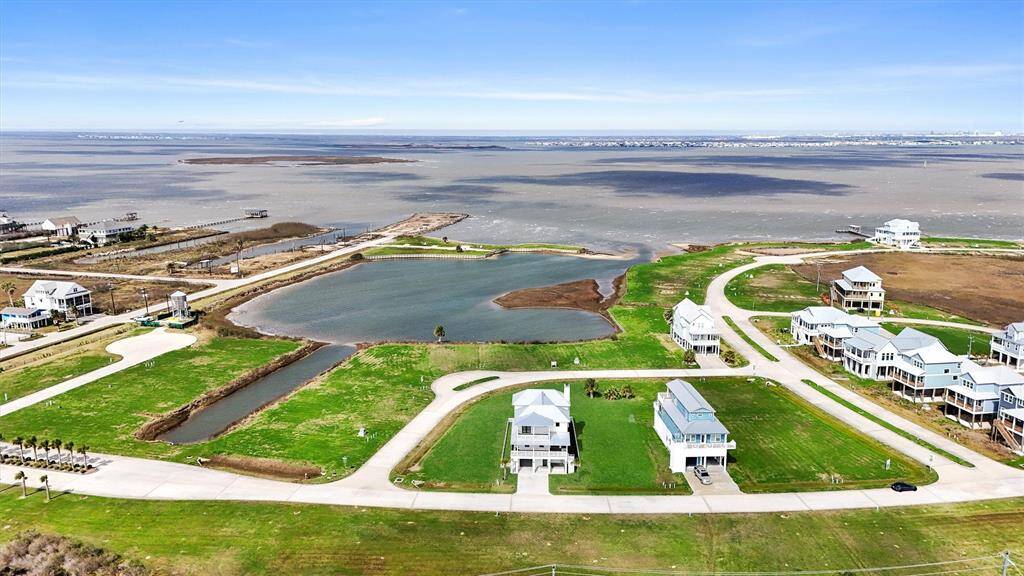 Nestled in an exclusive waterfront community, this home offers serene coastal living with unbeatable bay views.