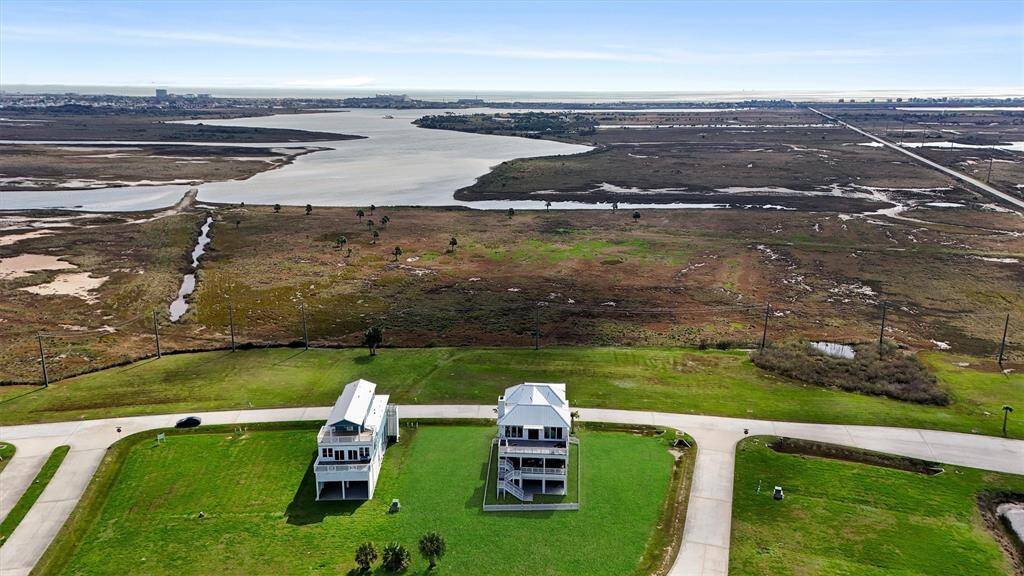 Nestled in an exclusive waterfront community, this home offers serene coastal living with unbeatable bay views.