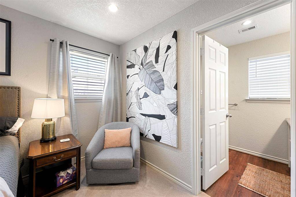 The primary suite has large closets, built-ins, and a large walk-in shower.