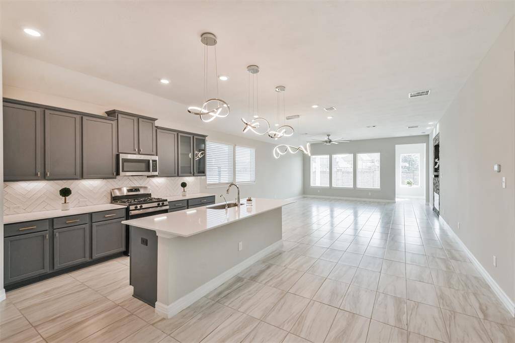 Large kitchen and living area.