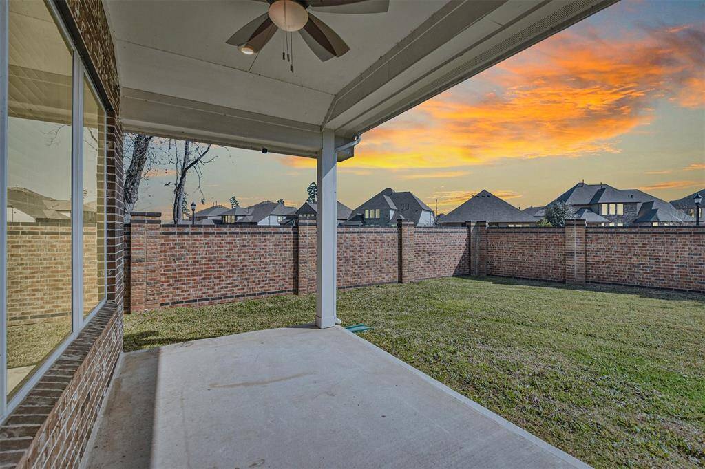 Large covered patio, no back or side neighbor.
